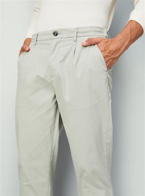 Buy Men Straight Fit Solid Flexi Waist Chinos Online at just Rs. 1199.0 ...
