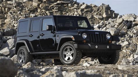 Download - "Black Jeep Wrangler Dominating the Rough and Rocky Terrain" Wallpaper | Wallpapers.com