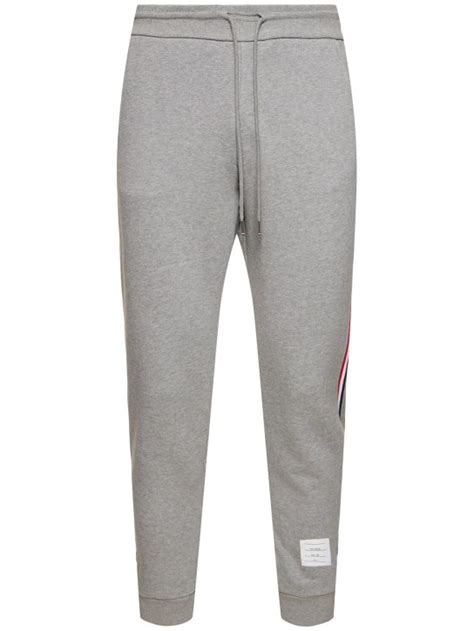 Cotton jersey sweatpants w/ logo patch - Thom Browne - Men | Luisaviaroma