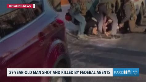 GRAPHIC WARNING: Man doesn't appear to have weapon in hands when shot ...