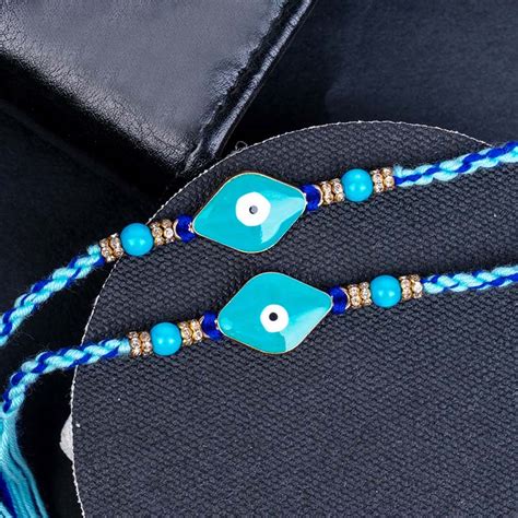 Send 2 Evil Eye Rakhi N 2 Designer Rakhi Set Online | Rakhibazaar.com