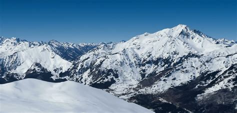 Panorama of snowy mountains Cold mountains and skyline snow-covered ...