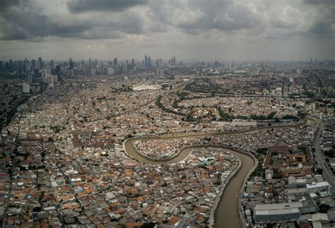 Indonesia's giant capital city is sinking. Can the government's plan save it? | National Geographic