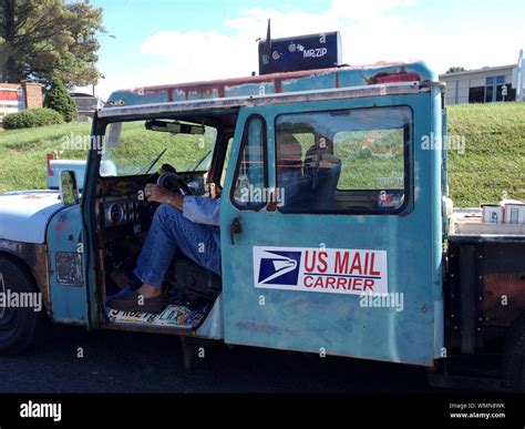 USPS worker delivering the mail from an old truck in rural U.S.A Stock Photo - Alamy