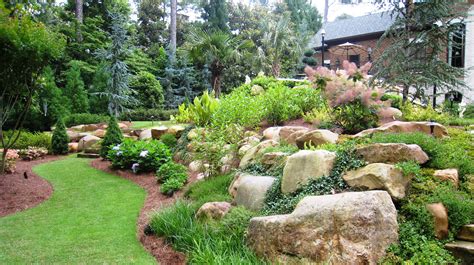 Solterra Landscape | Landscaping berm ideas, Landscaping with boulders ...