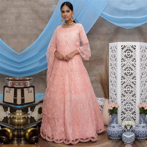 Trendy Peach Colored Party Wear Embroidered Net Gown