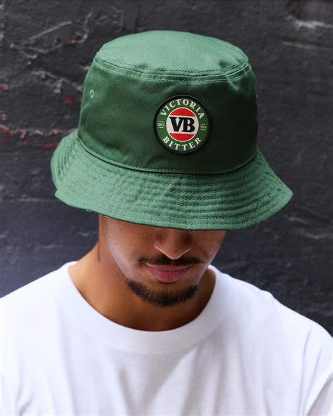 Shop Victoria Bitter Greenade Forever Reversible Bucket Hat In Green ...