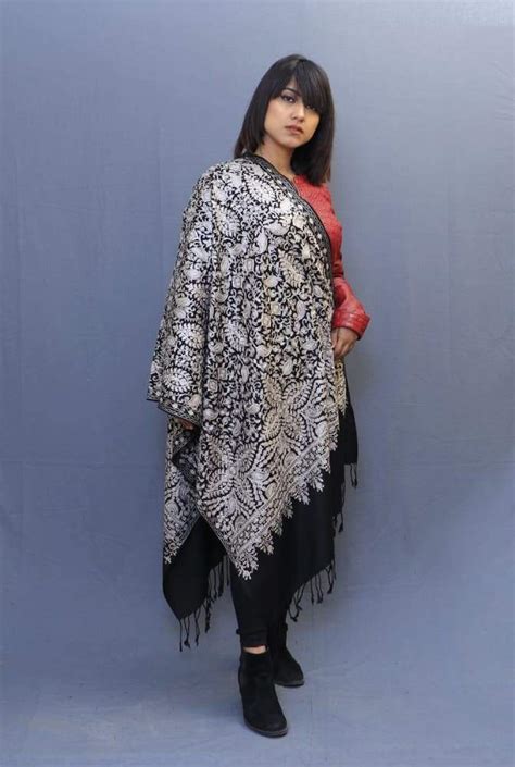 Black colour stole with kashmiri embroidery compliments the wearer