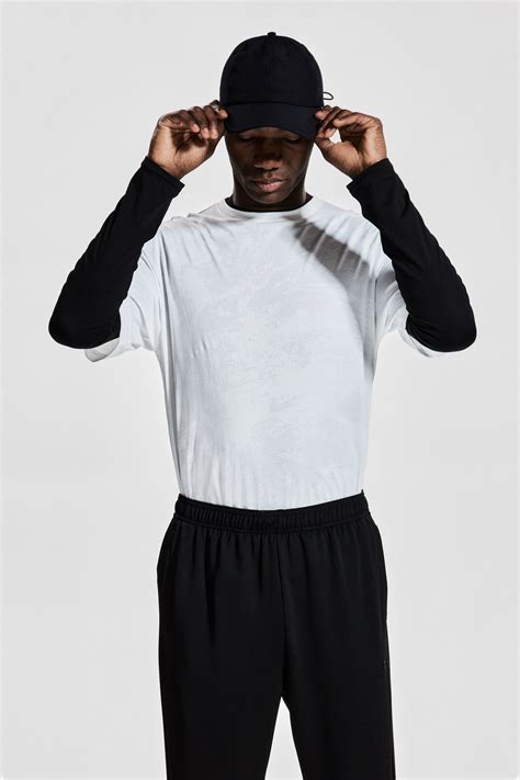 Slim Fit Track pants with DryMove™ - Black - Men | H&M IN