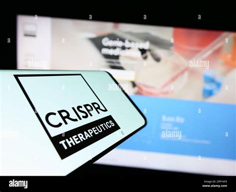Smartphone with logo of biotechnology company CRISPR Therapeutics AG on ...