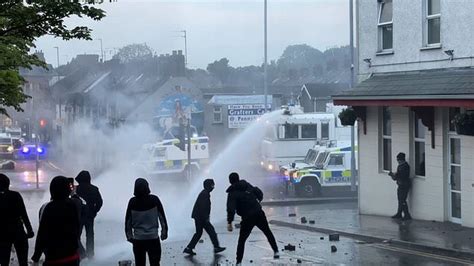 Police use water cannon on rioters in Ballymena