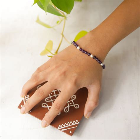 Semi precious stone bracelet in silver wire ( Amethyst , Pearls )