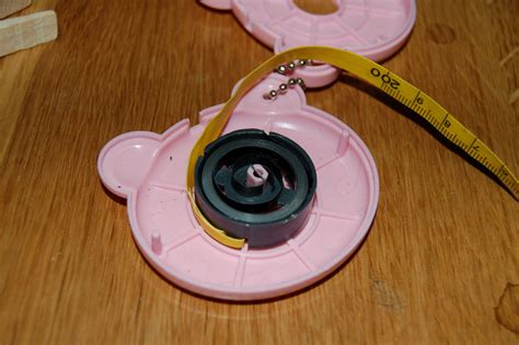Image result for How to Rewind a Tape Measure Spring