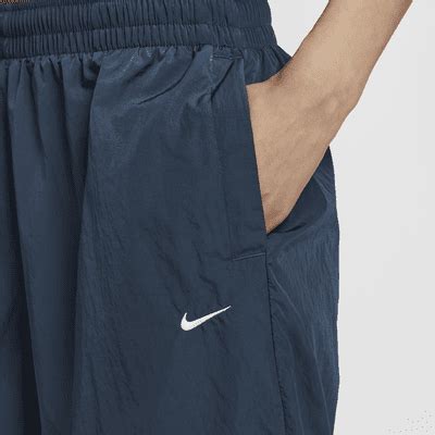 Nike Sportswear Essential Women's Mid-Rise Oversized Woven Joggers. Nike IN