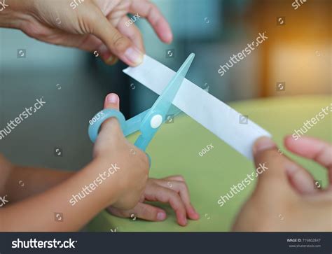 Image result for Child Using Scissors