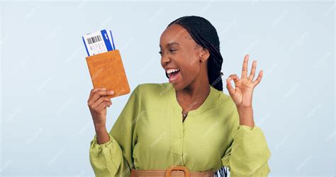 Premium Photo | African woman passport and studio with ok sign for airplane ticket documents or ...