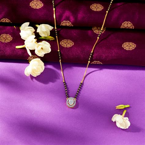 Buy Evil Eye Aura Yellow Gold Modern Mangalsutra For Woman Online at ...