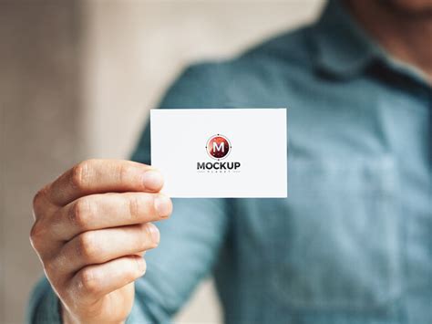 Free Man Holding in Hand Business Card Mockup PSD For Presentation ...