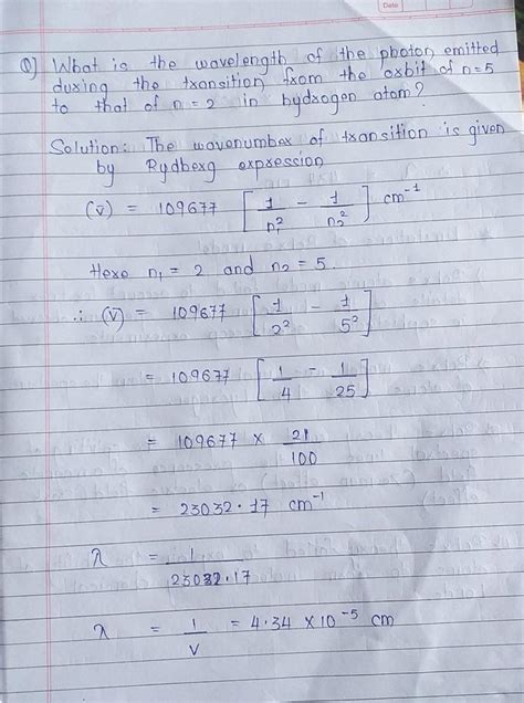 What are the frequency and wavelength of a photon emitted during a ...