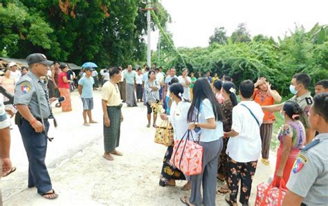 A released prisoner, right, is welcomed by her colleague after she was released from Insein Prison Sunday, Jan. 4, 2026, in Yangon, Myanmar. (AP Photo/Thein Zaw)