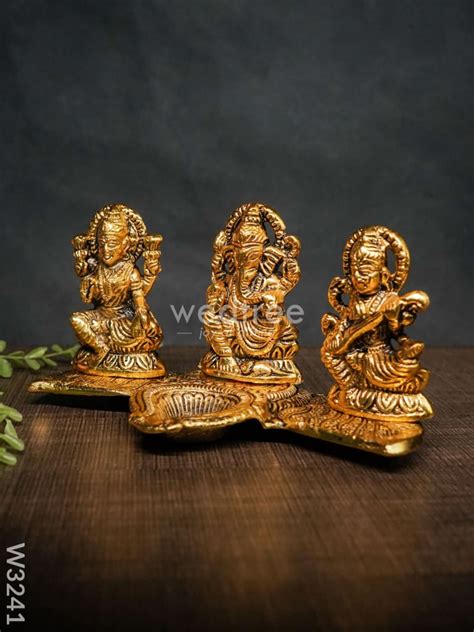 White Metal Lakshmi, Ganesha, Saraswati Diya - W3241 – Wedtree