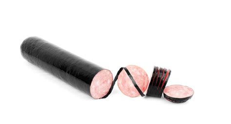 Sausage in a black wrapper on a white background | Premium Photo