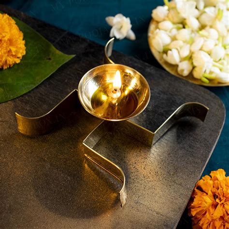 Buy Spiritual Swastik Brass Diya Online in India - Mypoojabox.in