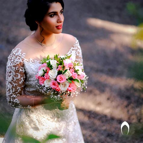 Signature Christian bridal Aline Full Fliar Net gown carried By Bride ...