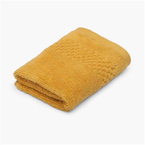 Buy SPACES Solid Textured Face Towel from Spaces at just INR 125.0