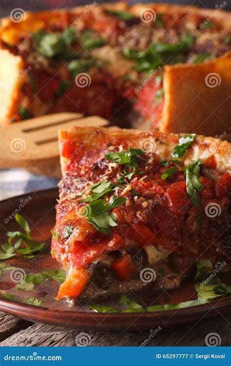 Slice of Chicago Deep Dish Pizza on a Plate Macro. Vertical Stock Image ...