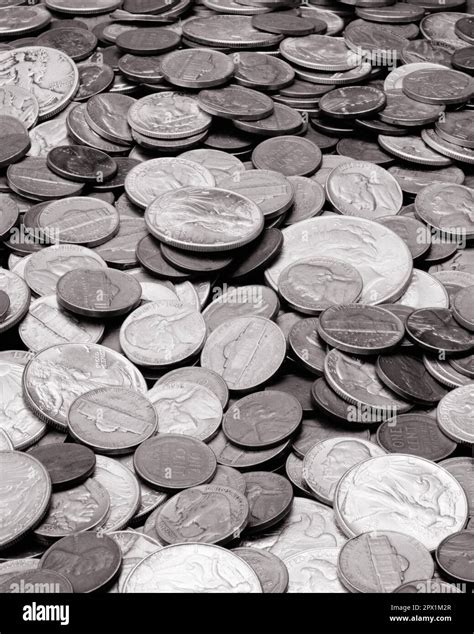 1950s UNITES STATES OF AMERICA COINS IN A BIG PILE SPREAD OUT AS ...
