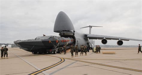 c5 a9 An A-10 being unloaded from a C5 Galaxy - Flying Tigers