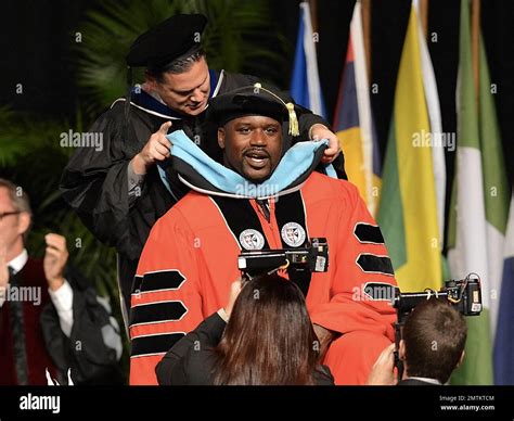 Shaquille O'Neal receives a doctoral degree in education from Barry ...