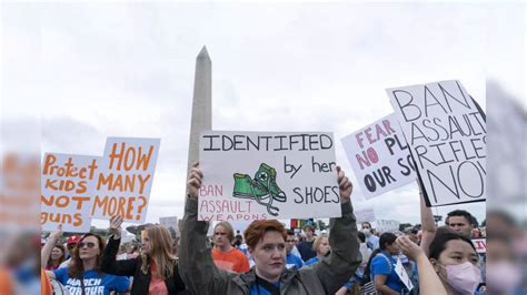 'Books, not bulletproof backpacks': Thousands demonstrate for action on ...