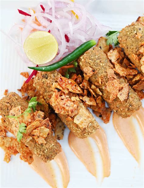 Check out the new menu with spicy nibbles and fancy cocktails at LMNO Q ...