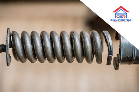 How much to fix broken torsion spring on garage door?