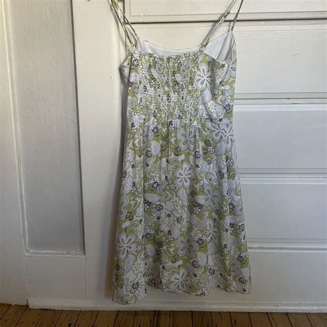aritzia mini retro floral dress, super cute with... - Depop