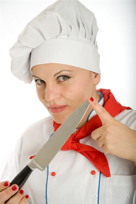 女厨师拿着菜刀照片-正版商用图片0aahmi-摄图新视界