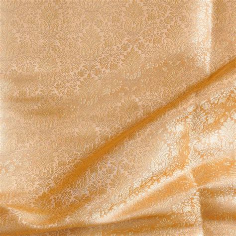 Banarasi Brocade Light Orange With Golden Zari Small Flower Jaal Fabri ...