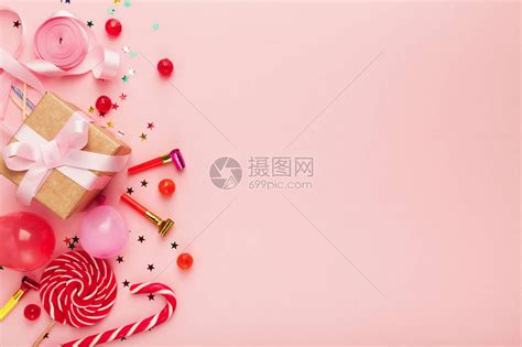 生日晚会背景彩蛋糖果棒糖和粉色表面礼品的边框复制插画图片下载-正版图片502515516-摄图网