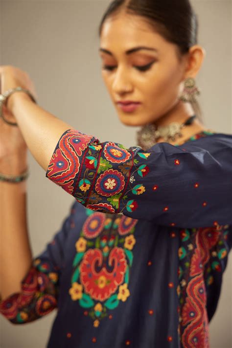 Indigo slim fit straight kurta set, decorated with bold appliqué borde ...