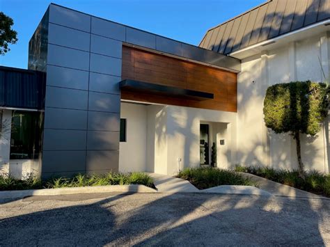 Image result for Mesh Cladding Cuildin