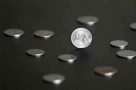 Rupee gains 14 paise in opening trade