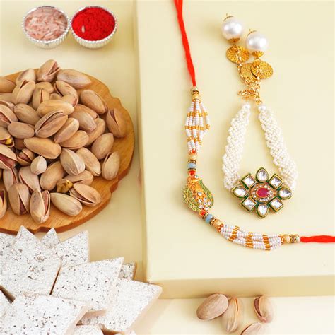 Send Enchanting Bhaiya Bhabhi Rakhi with Kaju Katli Gift Pack Online
