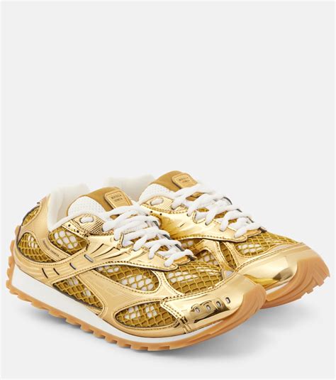 Orbit sneakers in gold - Bottega Veneta | Mytheresa