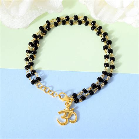 Pure Silver OM Hanging Black Nazariya Bracelet – Matree by Neha Wahi
