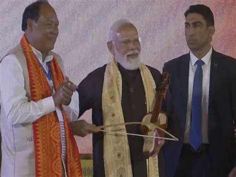 Assam: PM Modi attends 'Bagurumba Dwhou 2026', tries his hand at ...