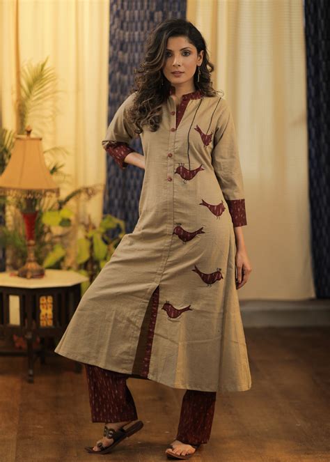 A-line Handloom Cotton kurta with exclusive Hand Cut Ikat Birds and Em ...