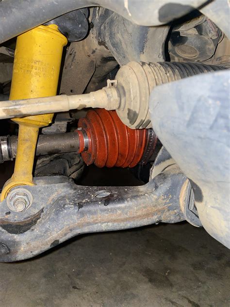 Inner cv joint is leaking grease but boot is not torn. Any ideas? This happens on both driver ...