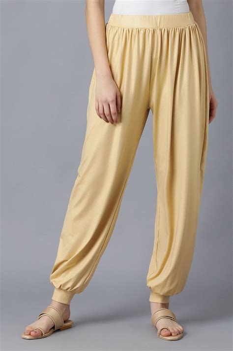 Buy Gold Solid Loose Fit Pants With Elasticated Waist Online for Elleven